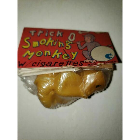 1960s Vintage Dime Store Toy Trick O Smoking Monkey w/ cigarette Yellow